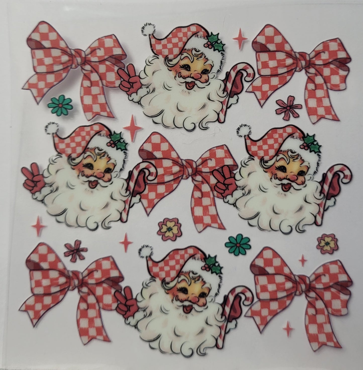 Santa's and bows decal small
